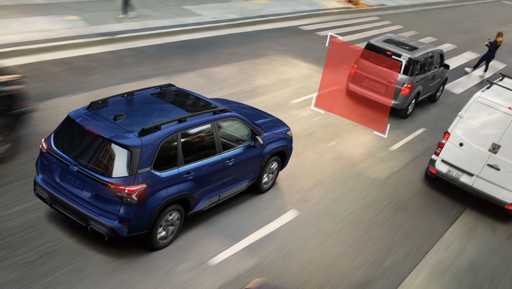 2026 Forester on a wet slippery road.
