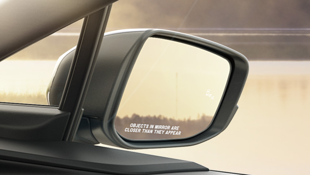 Close-up shot of 2026 Solterra heated, power adjustable side mirror.