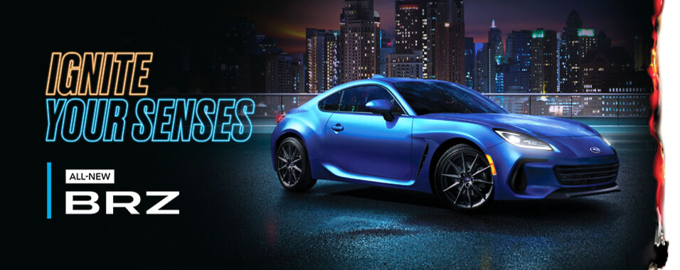 All-new BRZ in blue set against an evening cityscape